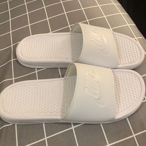 Nike slides. Mens size 9. Woman’s size 11